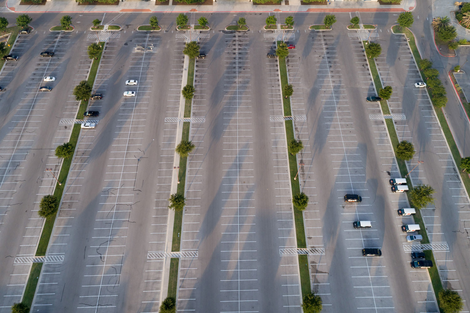 aerial parking lot that needs asphalt maintenance and striping